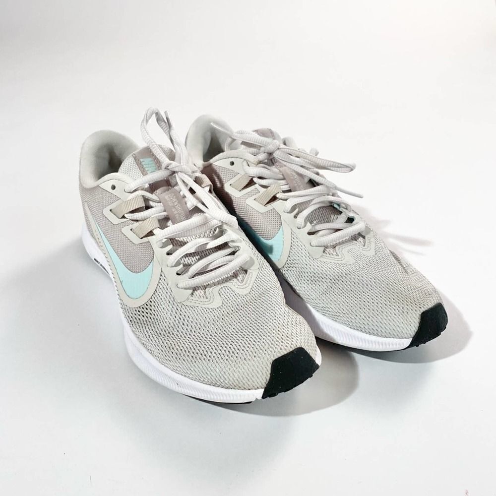 Grey and white Nike running shoes